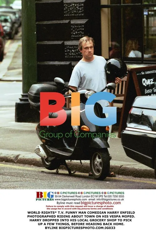 Comedian Harry Enfield on Vespa Moped