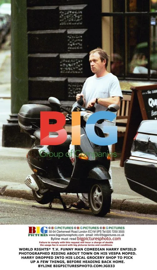 Harry Enfield Rides Vespa Moped