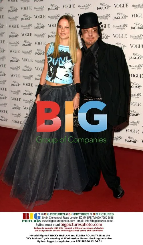 NICKY HASLAM and ELISIA ROUNDTREE at "it's fashion" gala