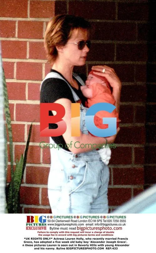 Lauren Holly seen with new adopted son