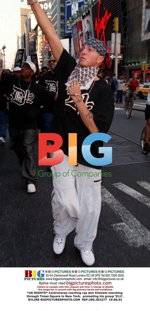 Eminem Marches Through Times Square