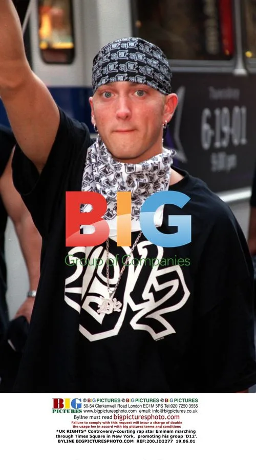 Eminem marches through Times Square, New York