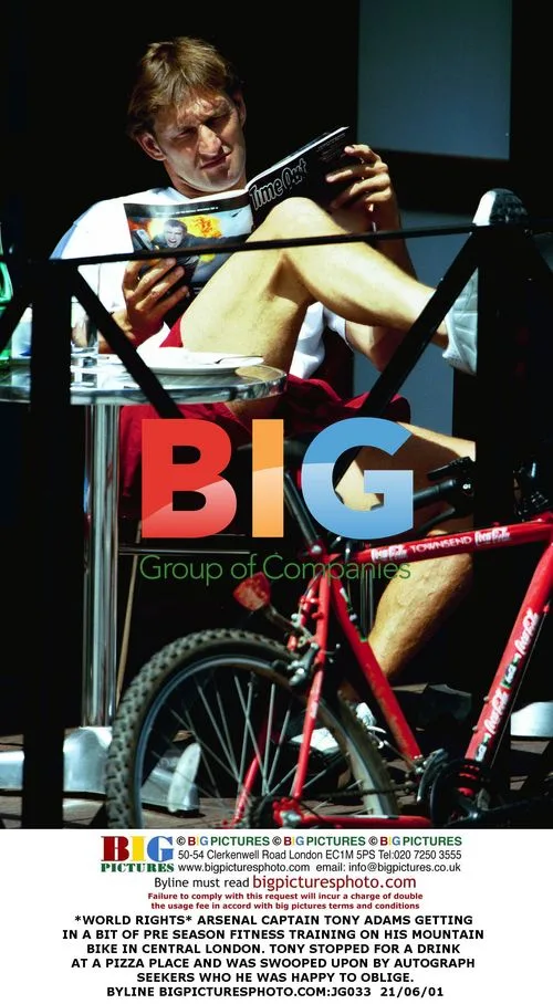 Arsenal Captain Tony Adams Bicycling in London
