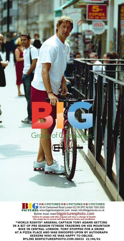Arsenal Captain Tony Adams Bicycling in London