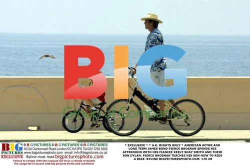 Pierce Brosnan Teaches Son Dylan to Ride Bike