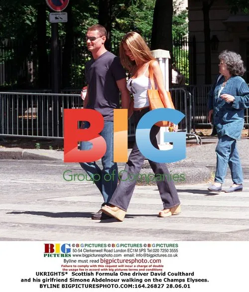 David Coulthard and girlfriend on Champs Elysees