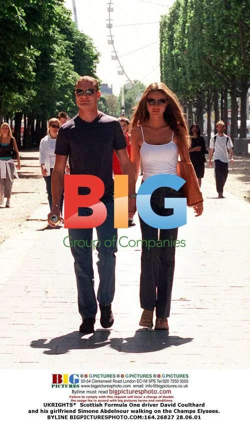 David Coulthard and girlfriend on Champs Elysees