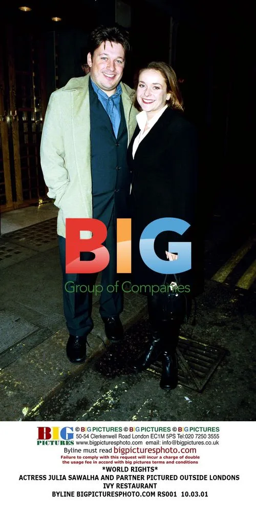 Julia Sawalha and partner outside London's Ivy