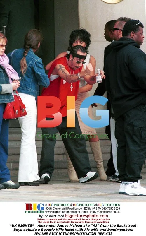 Backstreet Boys' AJ Mclean with wife outside hotel