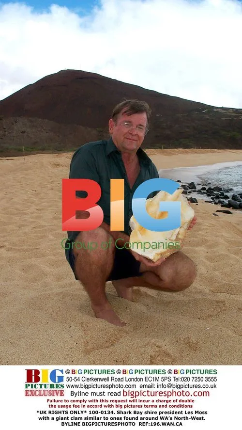 Shire president with giant clam