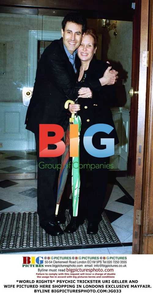 Uri Geller and Wife Shopping in Mayfair