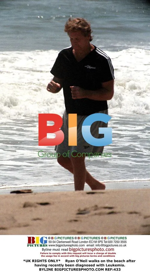 Ryan O'Neil on beach after Leukemia diagnosis