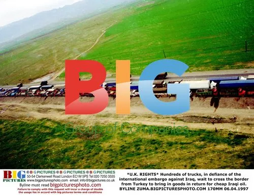 Trucks Defy Iraq Embargo at Turkish Border