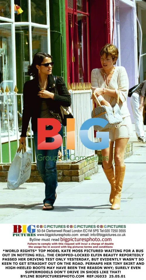 Kate Moss Waits for Bus in Notting Hill