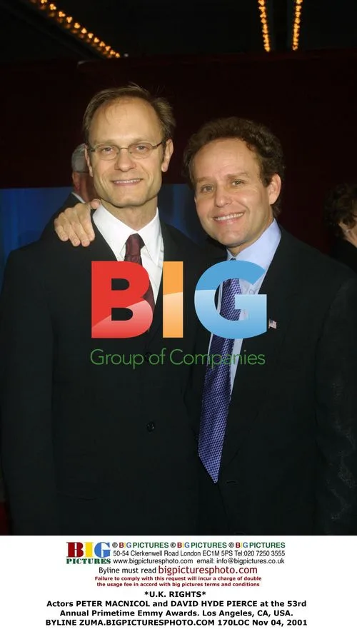 Actors PETER MACNICOL and DAVID HYDE PIERCE at Emmy Awards