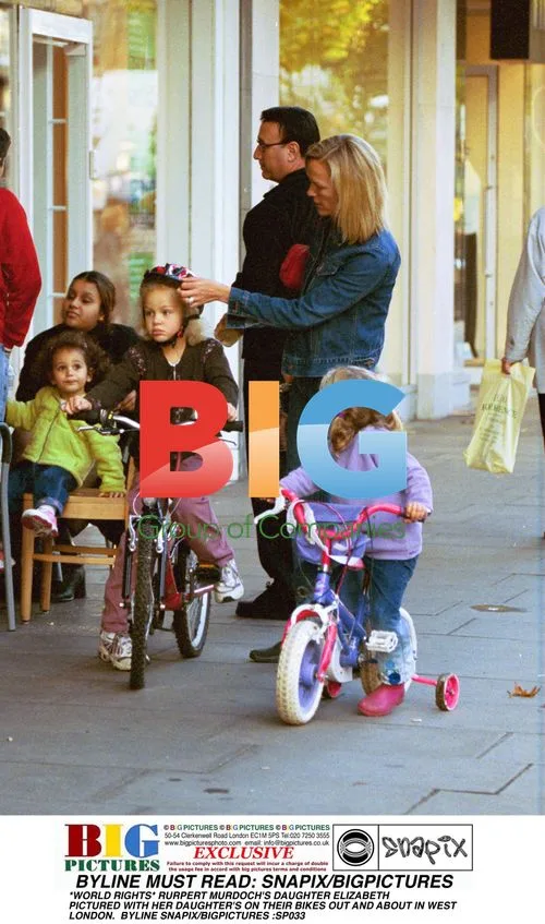 Elizabeth Murdoch and Daughters Bike in London