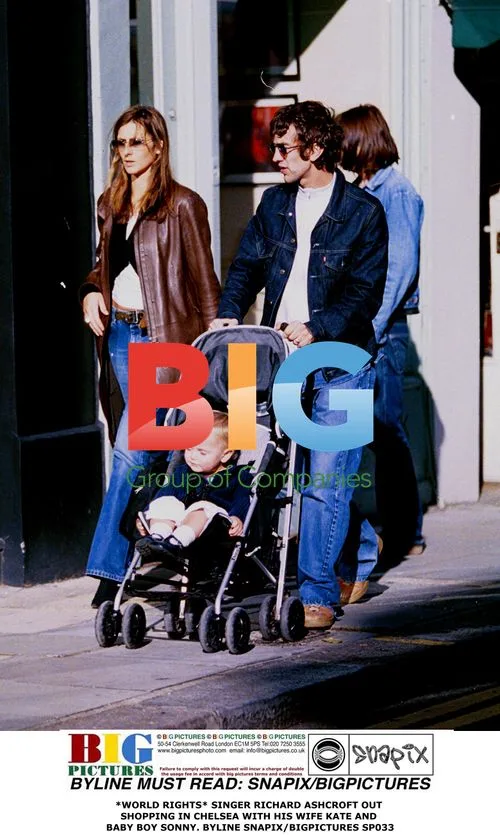 Richard Ashcroft with wife Kate and son