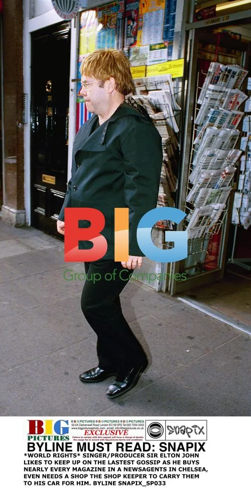 Elton John Buys Magazines