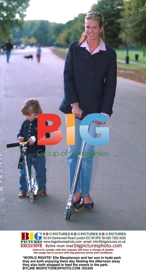 Elle Macpherson and Son Skating in Hyde Park