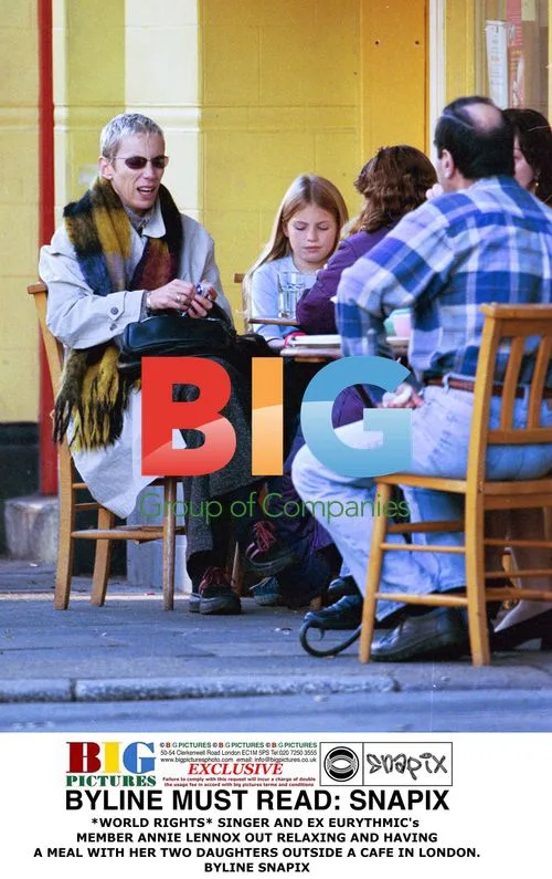 Annie Lennox out with daughters in London