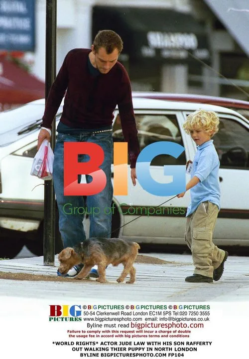 Jude Law and son Rafferty out walking puppy