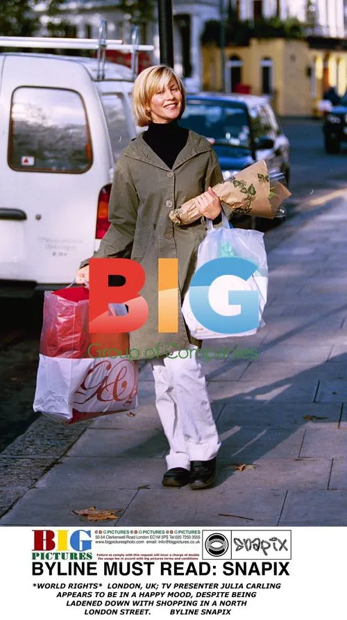 Julia Carling Carries Shopping in London