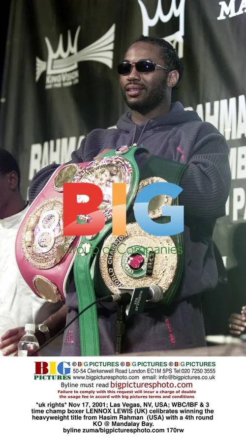 Lennox Lewis Wins Heavyweight Title