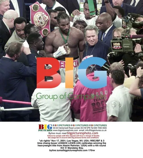 Lennox Lewis Wins Heavyweight Title