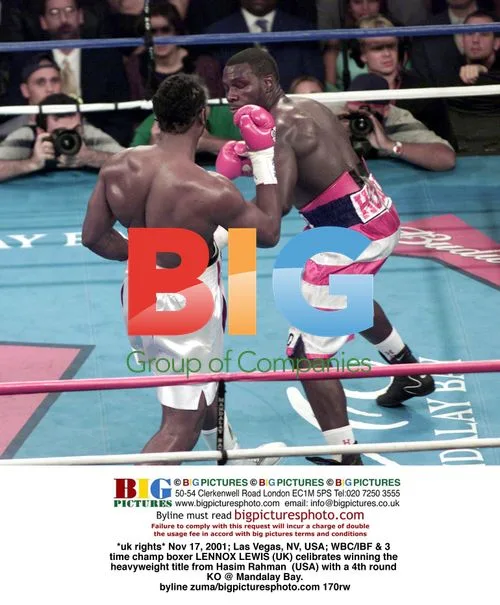 Lennox Lewis Wins Heavyweight Title