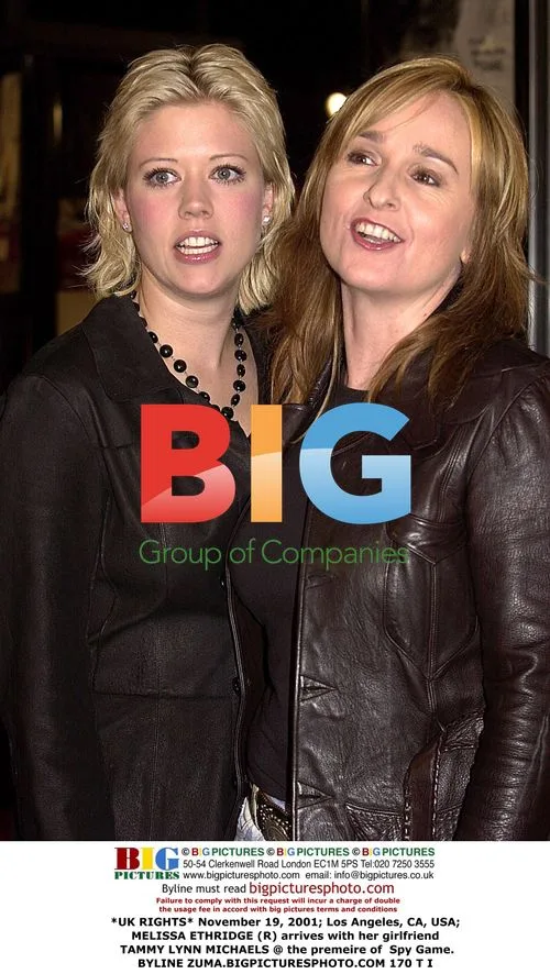 Melissa Etheridge arrives with girlfriend