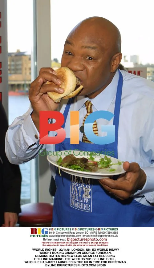 George Foreman demonstrates his new grill