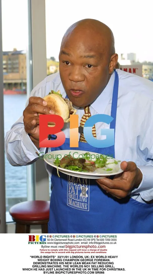 George Foreman Demonstrates New Grilling Machine