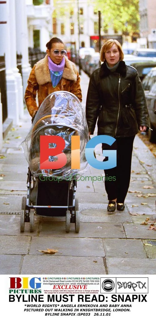 Angela Ermikova and baby Anna out in London