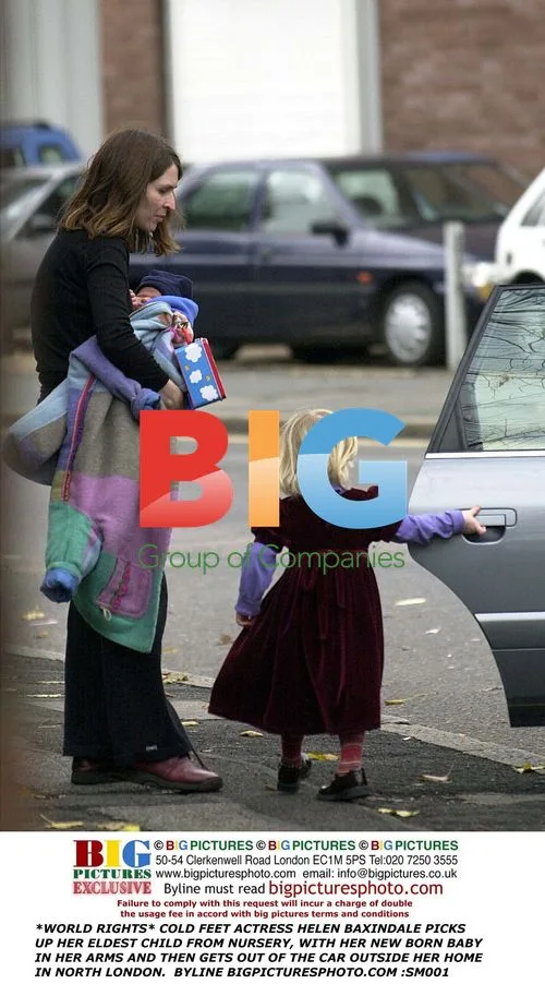 Helen Baxindale picks up child