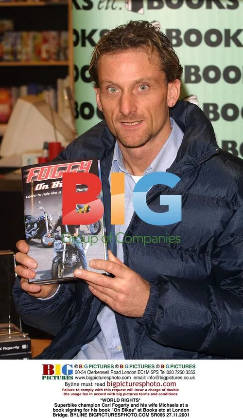 Carl Fogarty and wife Michaela at book signing