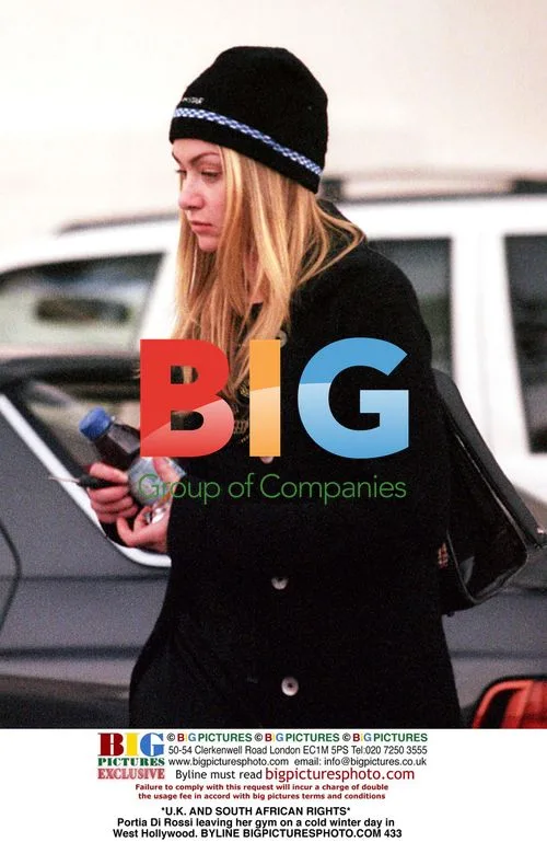 Portia Di Rossi leaves gym on cold day