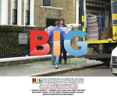 Robbie Williams Receives Mystery Delivery