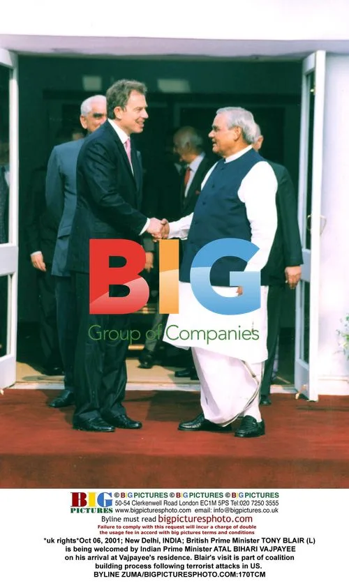 Blair Welcomed by Vajpayee in India