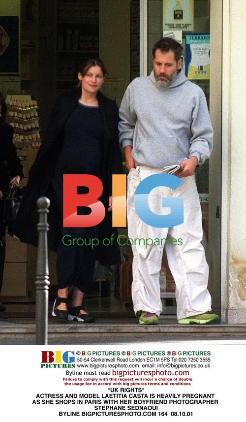 Laetitia Casta Shops Pregnant in Paris