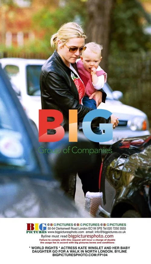 Kate Winslet and baby go for a walk
