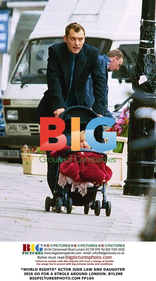 Jude Law and Daughter Iris Stroll in London