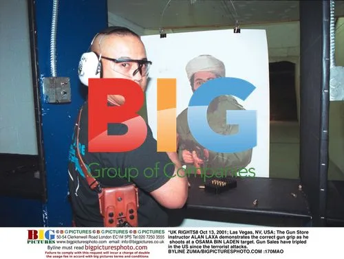 Gun instructor demonstrates shooting