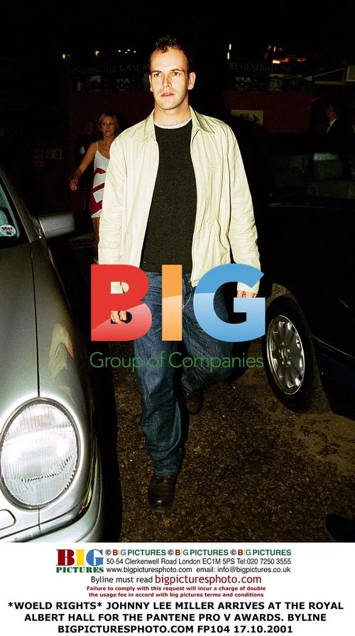 JOHNNY LEE MILLER ARRIVES AT ROYAL ALBERT HALL