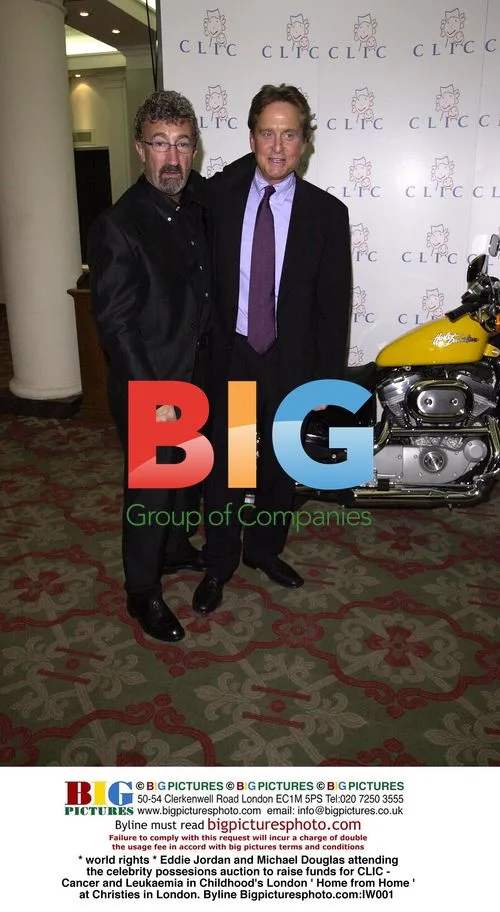 Eddie Jordan and Michael Douglas at Charity Auction