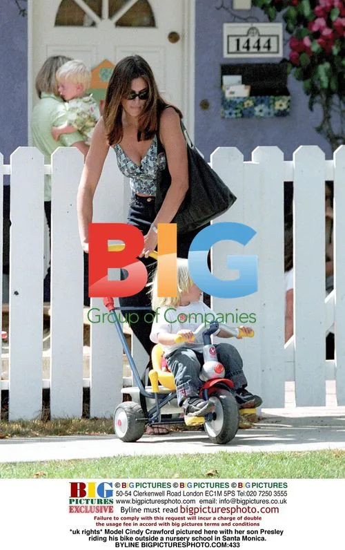 Cindy Crawford with son Presley biking