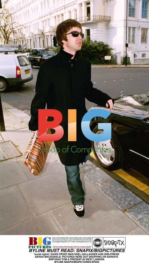 Noel Gallagher and Sarah Macdonald Shopping