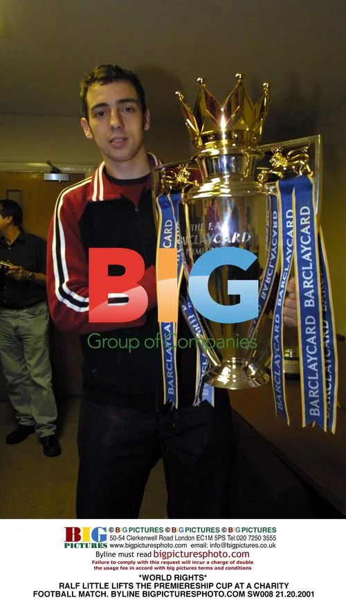 Ralf Little Lifts Premiereship Cup at Charity Match