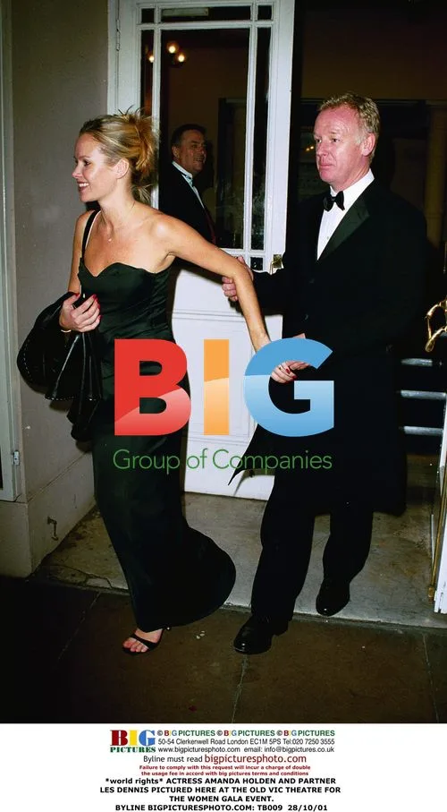 Actress Amanda Holden and partner Les Dennis