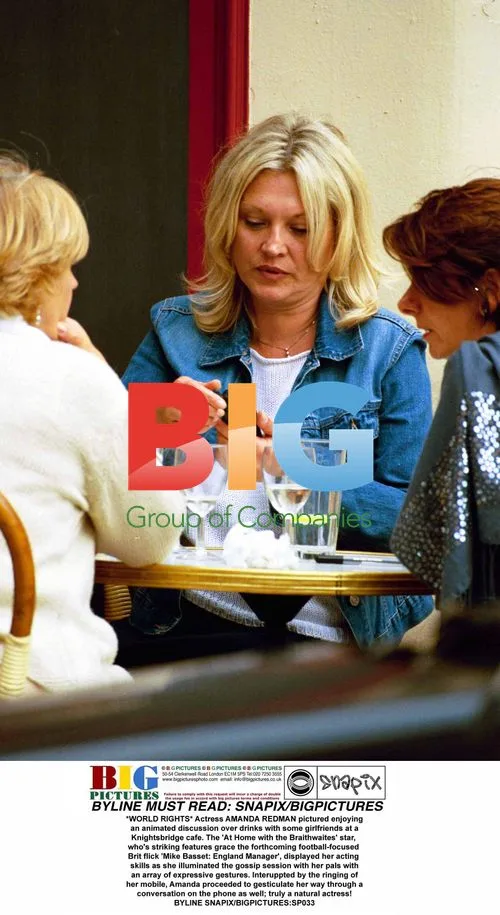 Amanda Redman Enjoys Animated Cafe Chat with Girlfriends