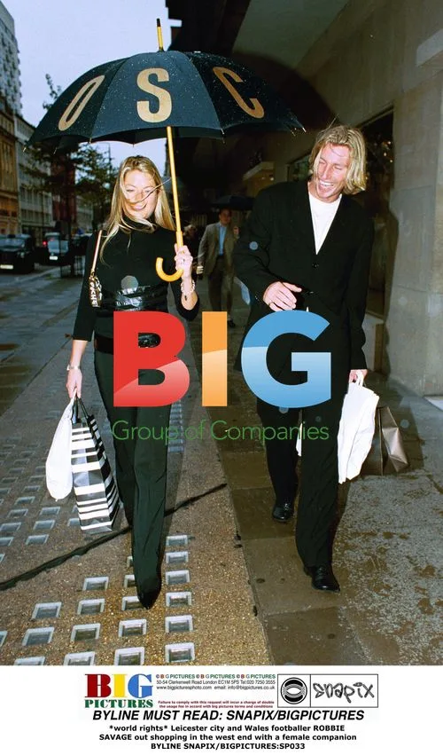 Robbie Savage Shopping in London